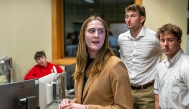 A photo of SPIFFY members in a classroom during a club meeting