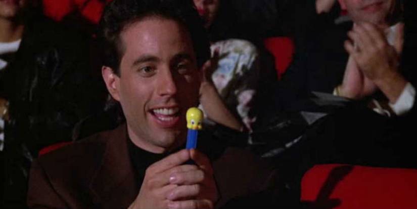 Jerry Seinfeld looking at a Tweety Pez Dispenser in Seinfeld season 3