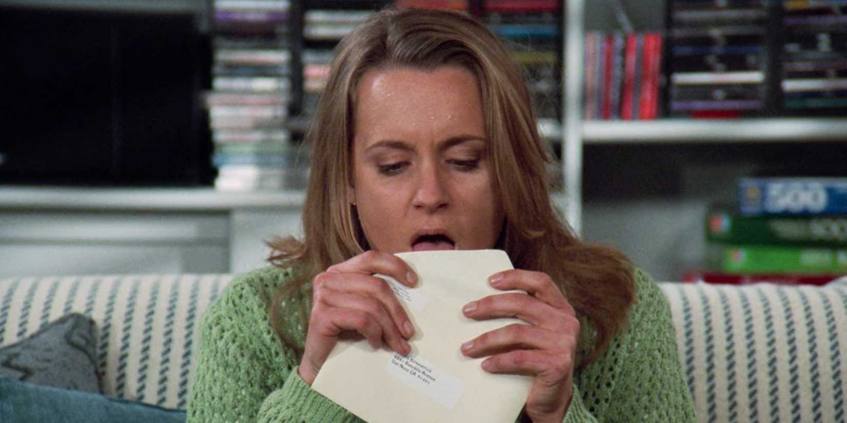 Susan licking an envelope in Seinfeld season 7.