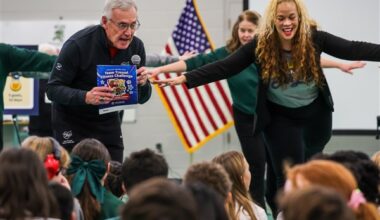 Lt. Gov. Jim Tressel exercises with students at Our Lady of Perpetual Help