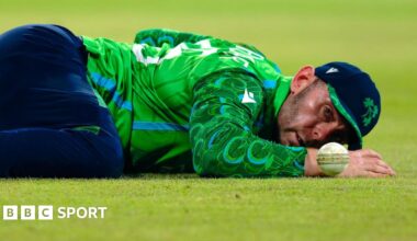 Ireland's Ross Adair lies on the ground after missing a catch