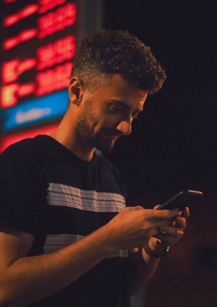 adult man focus on his phone