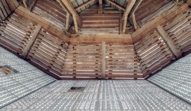 alexandre de betak inserts reflective light installation into swiss barn