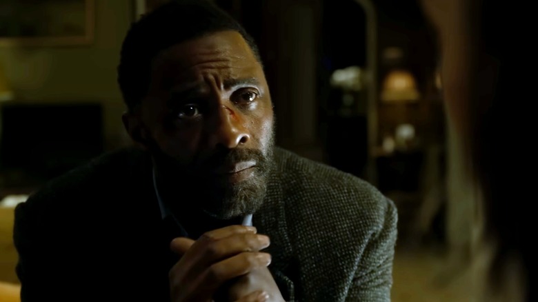 John Luther looking concerned in Luther: The Fallen Sun