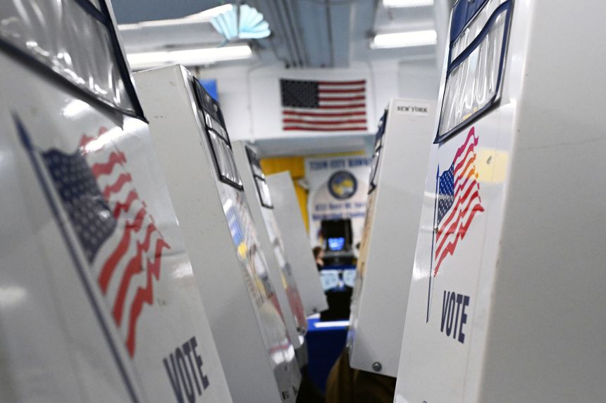 Voting booths set up in a polling place in the West Village of New York on October 30, 2025, during early voting.