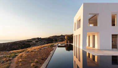 monolithic 'avlakia house' overlooks island of antiparos, greece