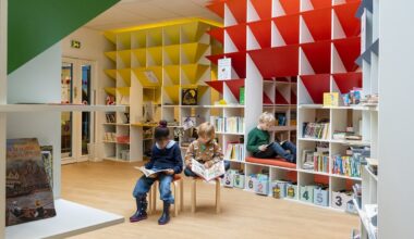 children enjoy reading village of colorful huts at paris school library