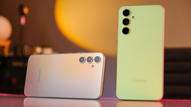 Two Samsung Galaxy A54 phones on a table