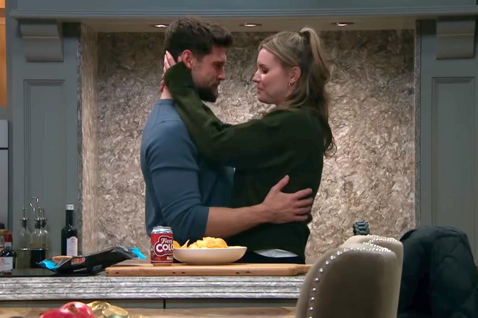 emmerdale, joe tate and dawn fletcher hugging in the kitchen