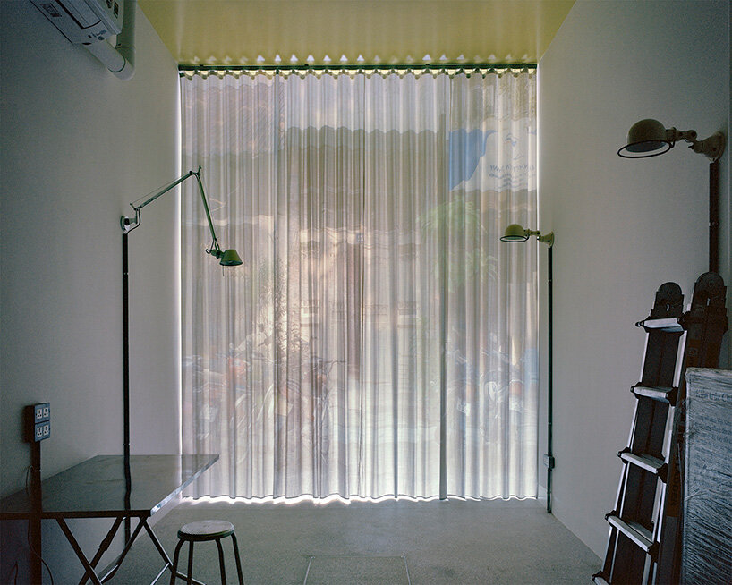 the team selectively reinforces the original concrete column-and-beam structure with brick infill