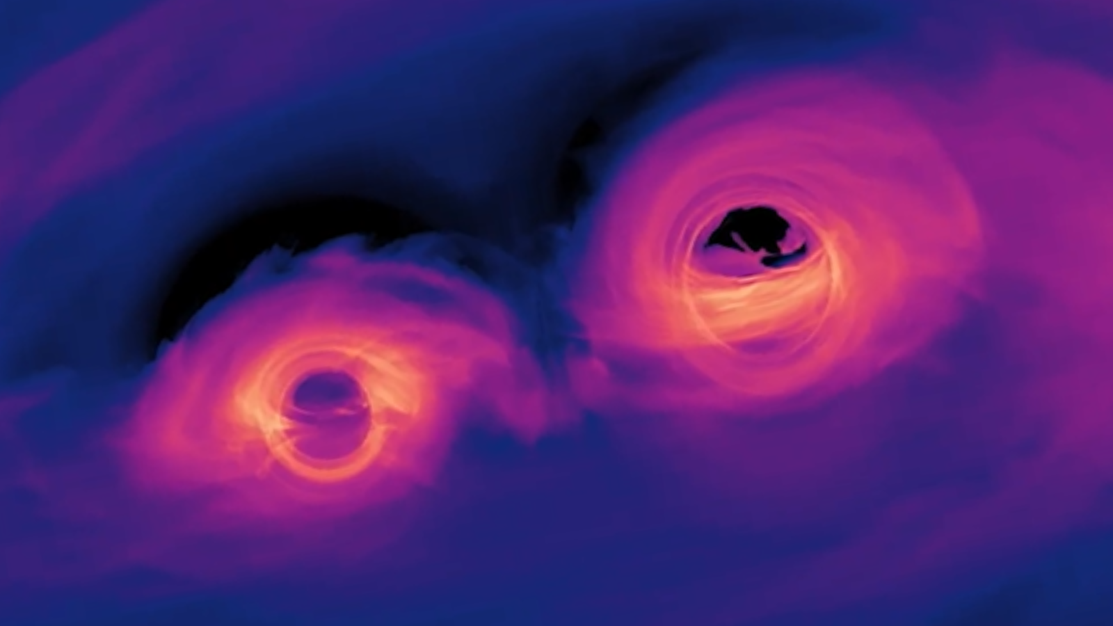 A screenshot from a simulation of colliding supermassive black holes