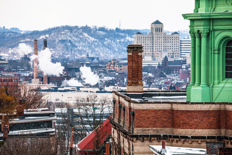 A smoky, industrial shot of Pittsburgh in winter.