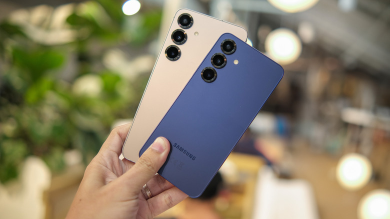 Samsung Galaxy phones in a hand