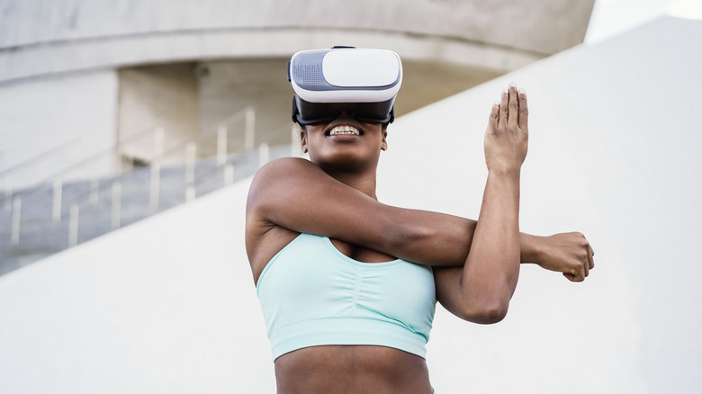 Stretching for a workout with a VR headset