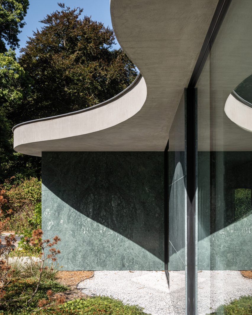 Curved concrete roof on top of The Garden Pavilion by Studio Okami