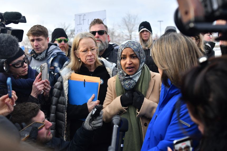 Left to right, Rep. Kelly Morrison (D-MN), Rep. Ilhan Omar (D-MN) and Rep. Angie Craig (D-MN) speak with reporters after visiting with immigration officials at the Bishop Henry Whipple Federal Building in Minneapolis on January 10