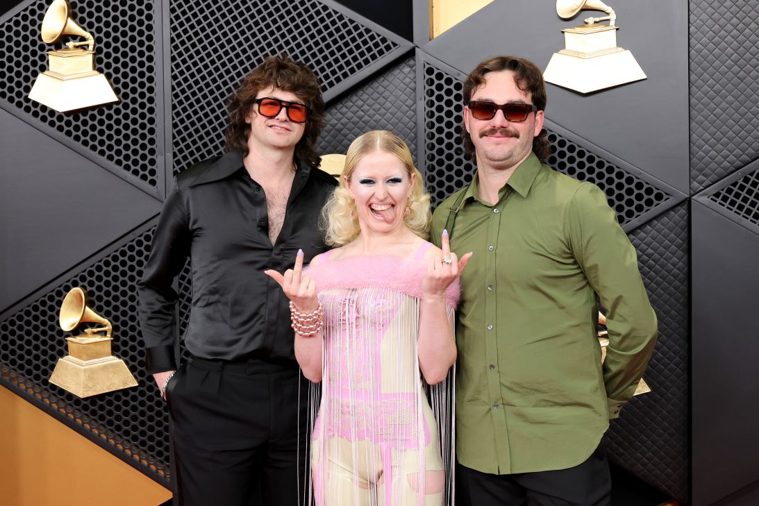 From left to right, Dec Martens, Amy Taylor, and Bryce Wilson of Amyl and the Sniffers at the 68th annual Grammy Awards.