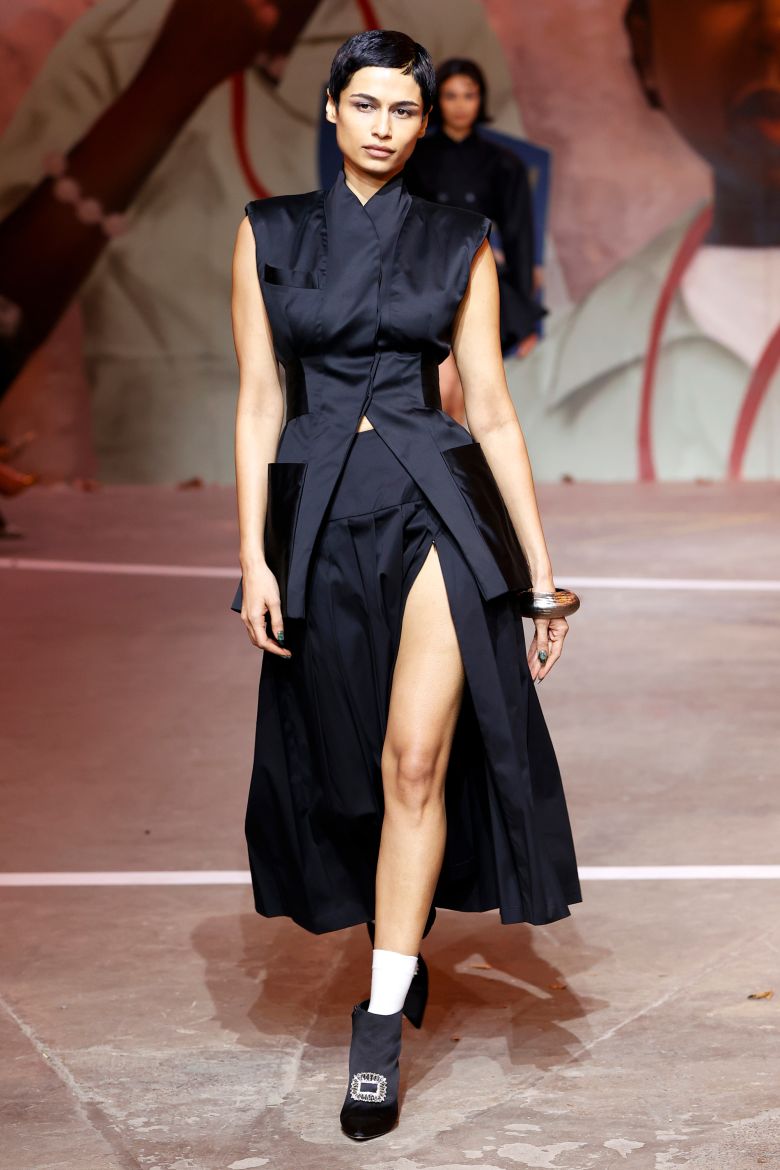 A structured jacket is paired with a co-ordinated skirt.