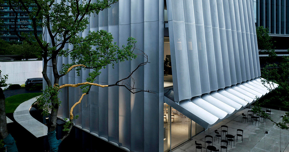 perforated facade peels from TAOA's hangzhou empathy museum