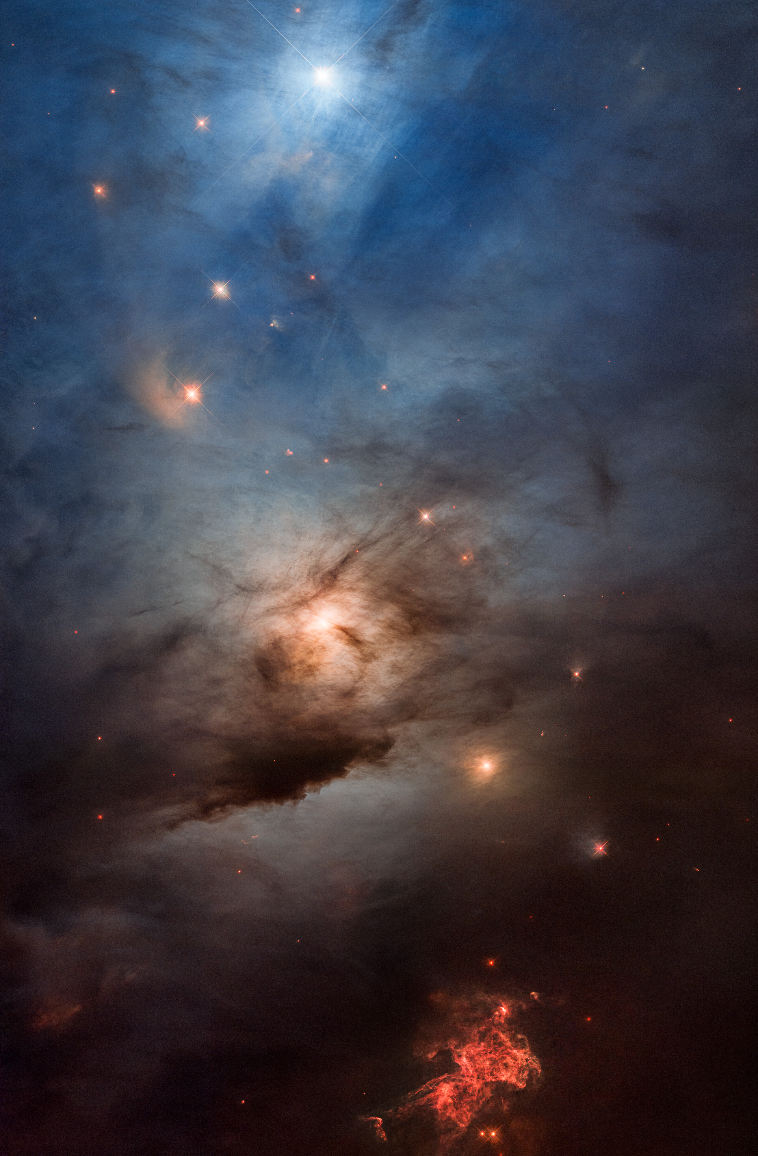 A bright blue star illuminates a region of dark and light clouds with scattered stars and red nebulae in deep space, reminiscent of a JWST reveal that unveils the universe's hidden wonders.