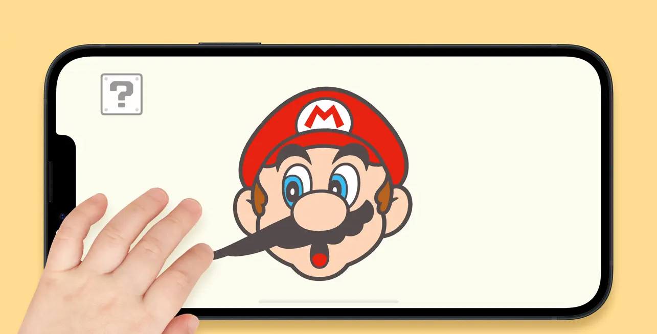 A finger pulls on Mario’s mustache in the Nintendo Hello, Mario! app running on an iPhone.