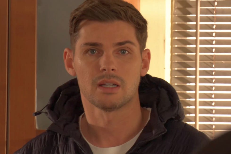 hollyoaks, ste hay looking worried inside the house kitchen