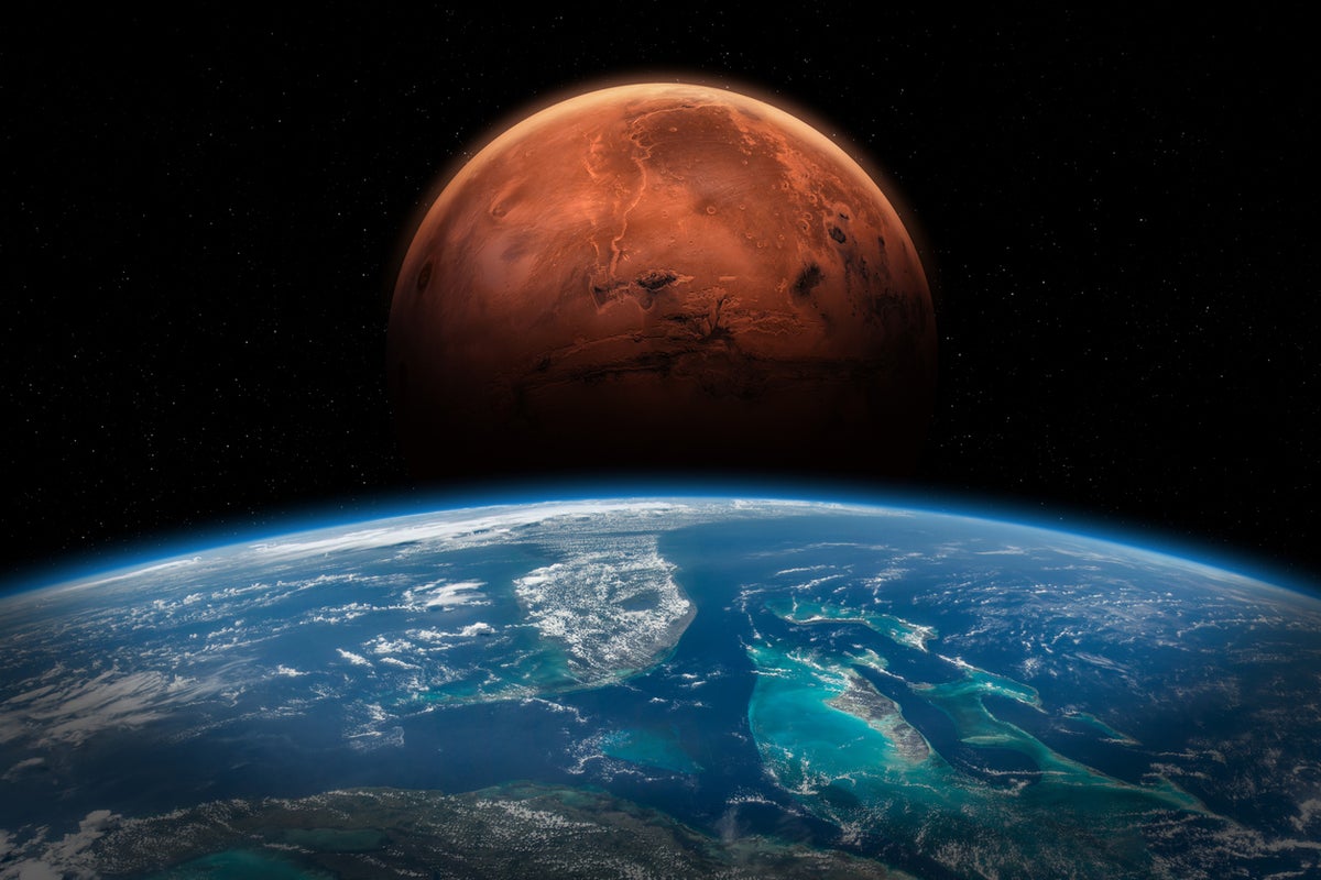 Scientists believe Mars was originally warm and wet not icy, contrasting old data