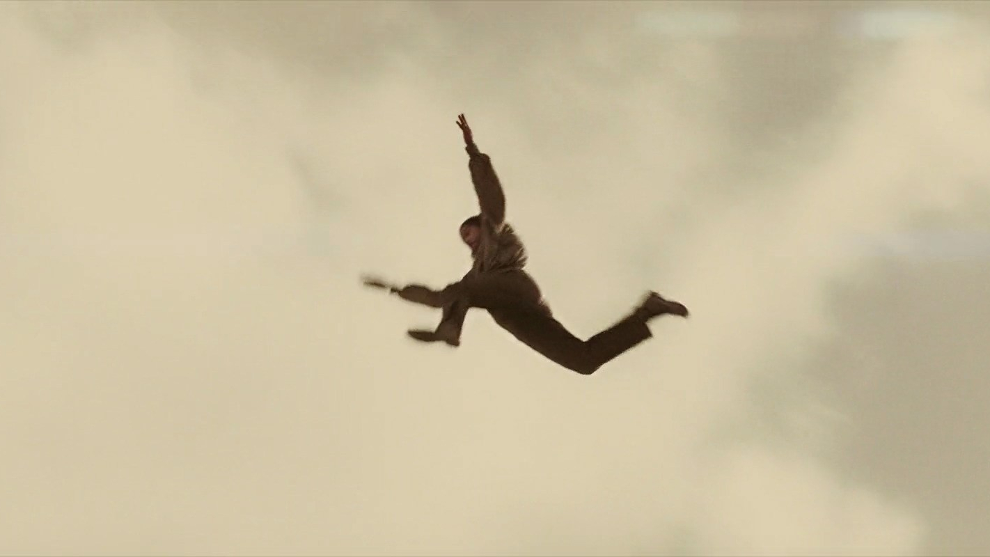 Screenshot from the 2012 movie "John Carter" showing the titular character jumping in low gravity.