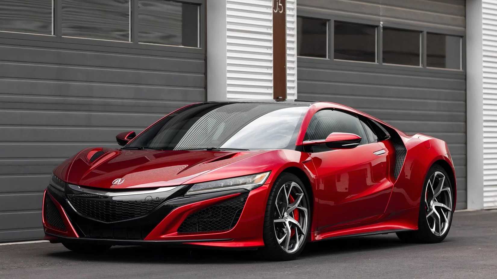 2017 Acura NSX in red parked outside