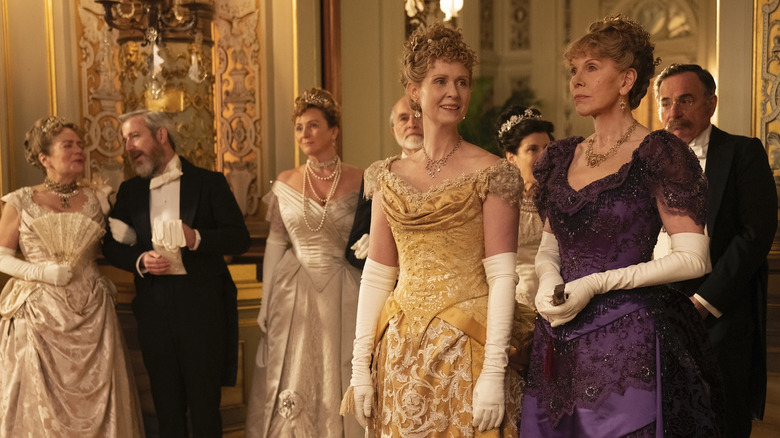 Ada Forte (Cynthia Nixon) and Agnes van Rhijn (Christine Baranski) stand at a glamorous ball in The Gilded Age