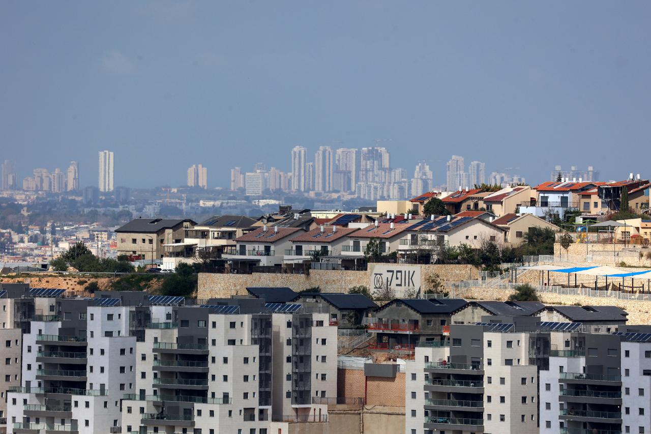 A view of the Israeli settlement of Tzufim in the north of Qalqilya city in occupied West Bank is pictured against the backdrop of Israeli city of Netanya on February 25, 2026. (AFP Photo)