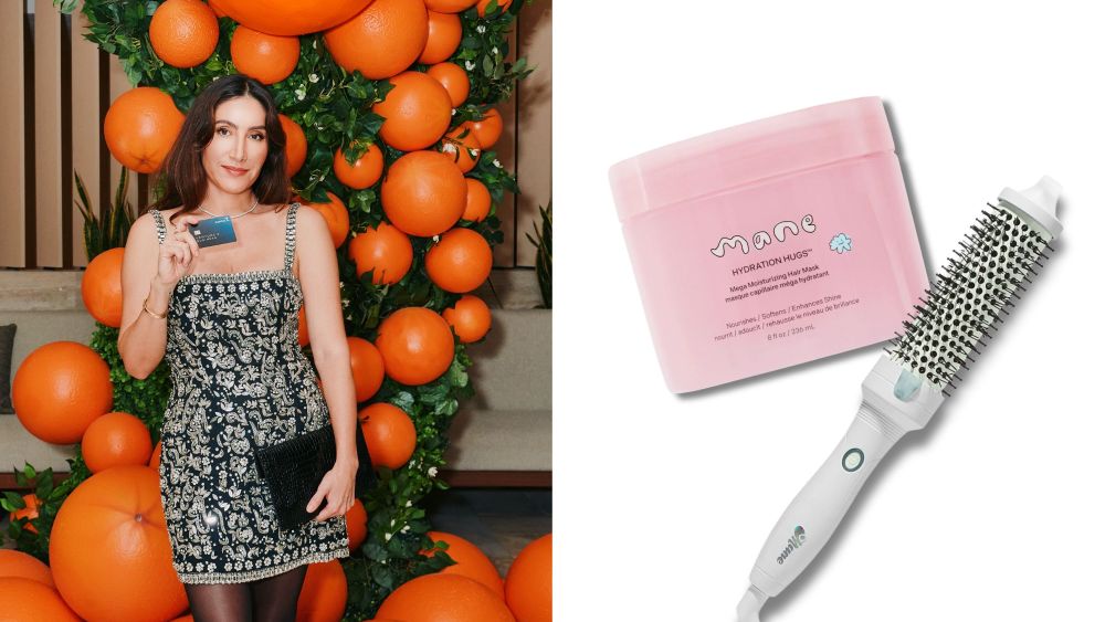 hair stylist jen atkin posing at a capital one event, holding the company's venture x business credit card; a mane hair mask and hot brush overlaid on a white background