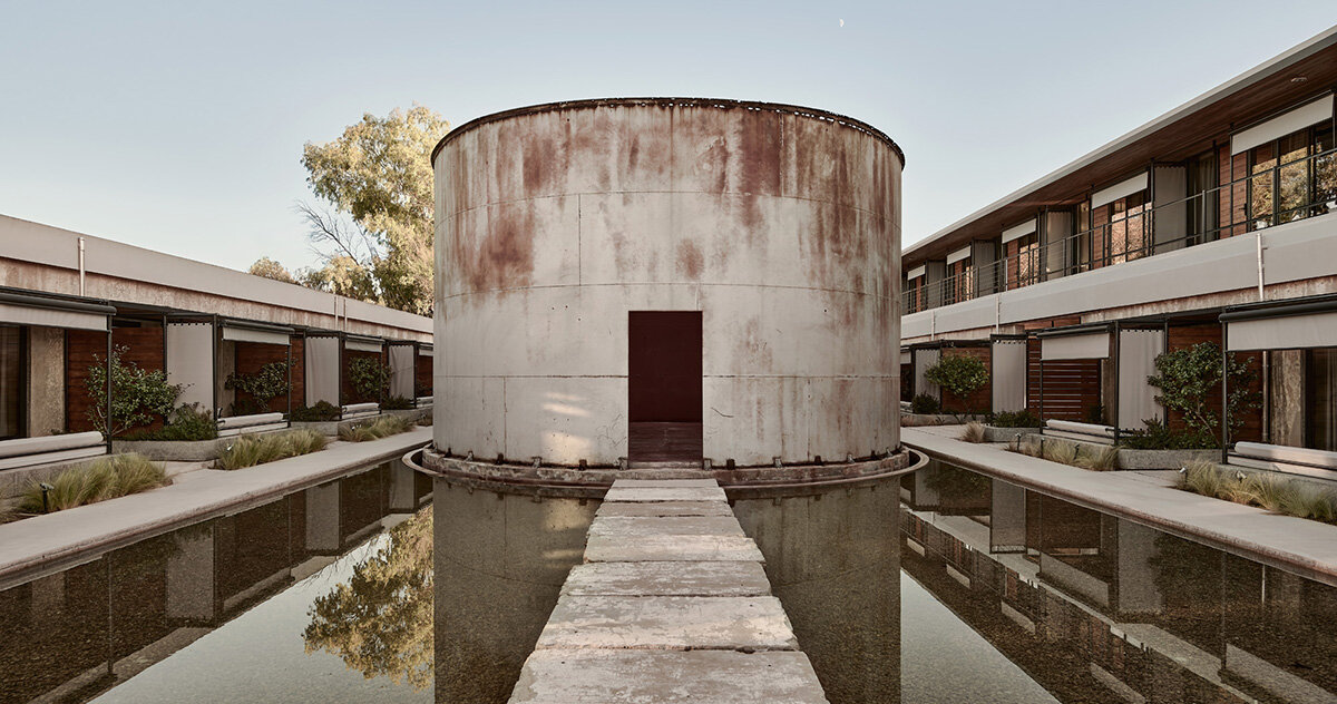 k-studio expands wine factory-turned-hotel 'dexamenes' in greece