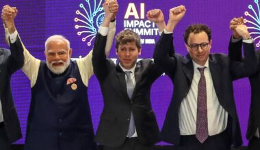India's Prime Minister Narendra Modi (L) takes a group photo with AI company leaders including OpenAI CEO Sam Altman (C) and Anthropic CEO Dario Amodei (R) at the AI Impact Summit in New Delhi on February 19, 2026.