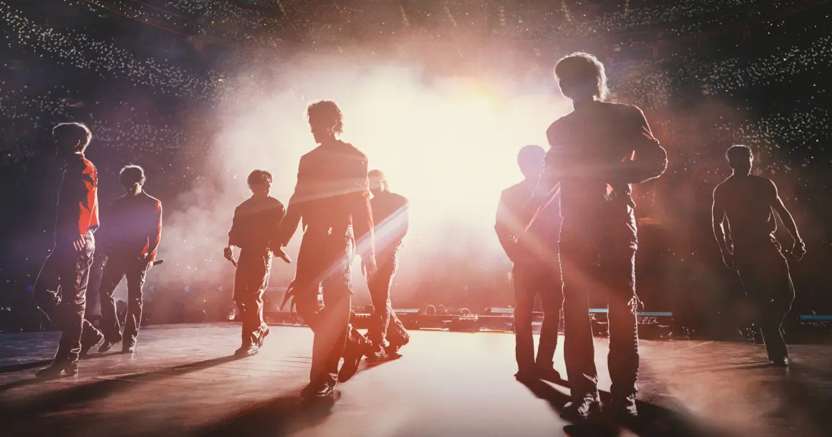 Stray Kids on stage at SoFi Stadium from a still from "Stray Kids: The Dominate Experience" (JYP Entertainment)