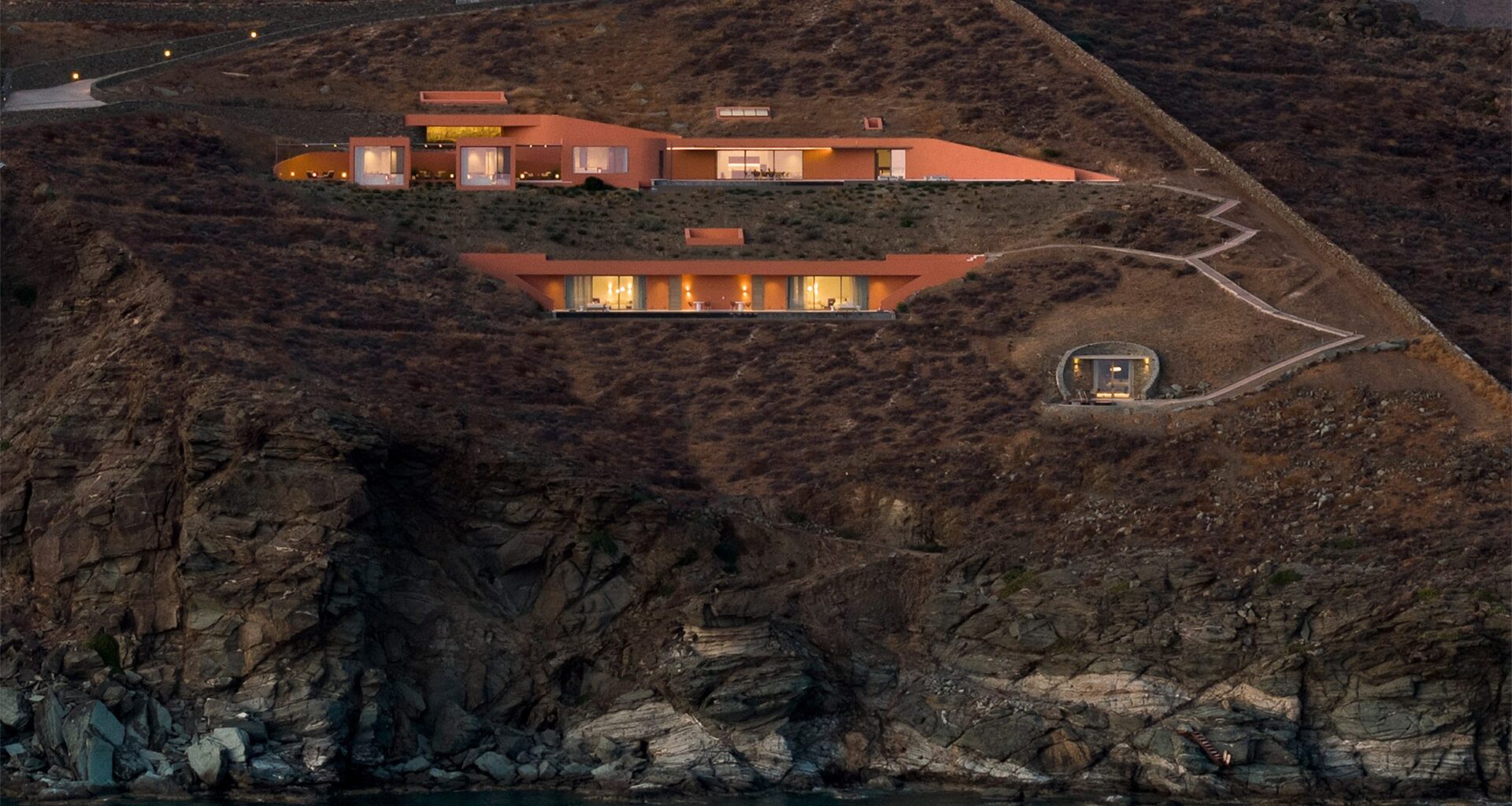 Ateno Architecture Studio sinks Olen resort into Greek cliff edge