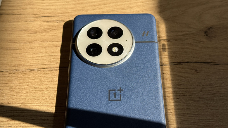 OnePlus 13 in blue color.
