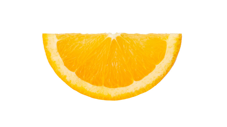 Cut orange on a white background