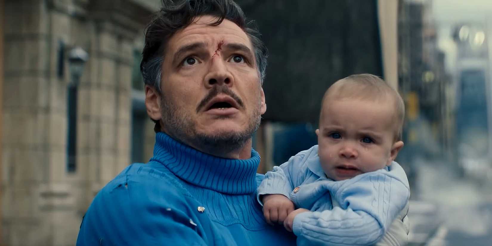 Pedro Pascal's Reed Richards looking scared while holding Franklin in The Fantastic Four First Steps