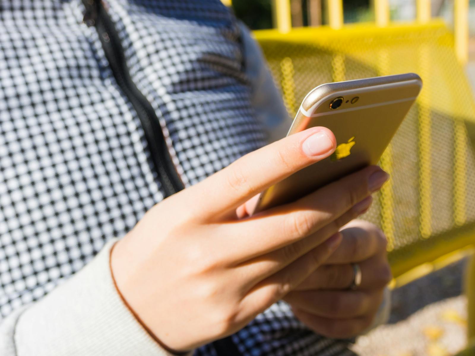 person checking phone anxiously