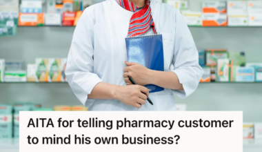 pharmacist standing in front of medications