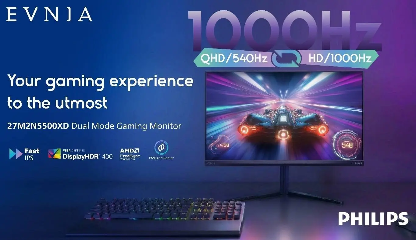Philips Evnia 27M2N5500XD monitor with a futuristic race car game displayed, QHD/540Hz, HD/1000Hz refresh rates.
