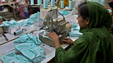 A garment worker inside the sewing section of a garment factory in Ashulia, on the outskirts of Dhaka, Bangladesh, on 19 April 2025. Photo: Fatima Tuj Johora/Reuters