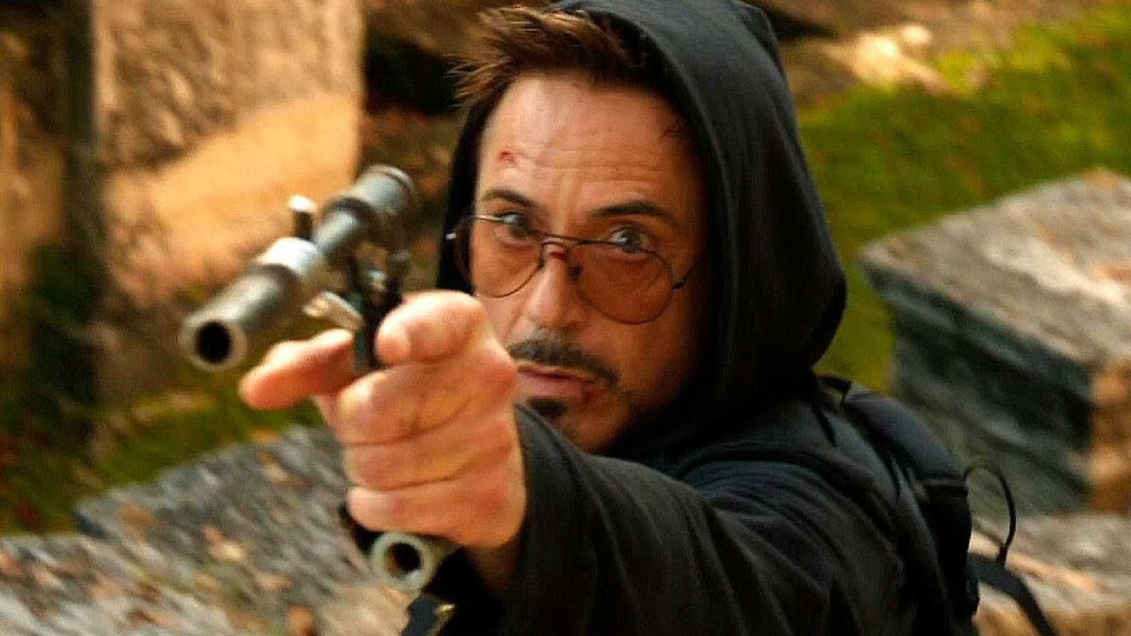 Robert Downey Jr's Tony Stark shoots a homemade gun in Iron Man 3