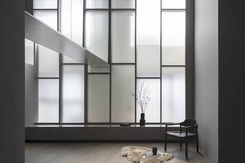 geometric frosted glass screens filter daylight within renovated room 1101 osaka apartment