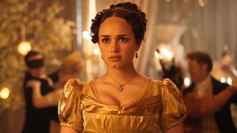 Charlotte Heywood (Rose Williams) stands at an evening ball in Sanditon