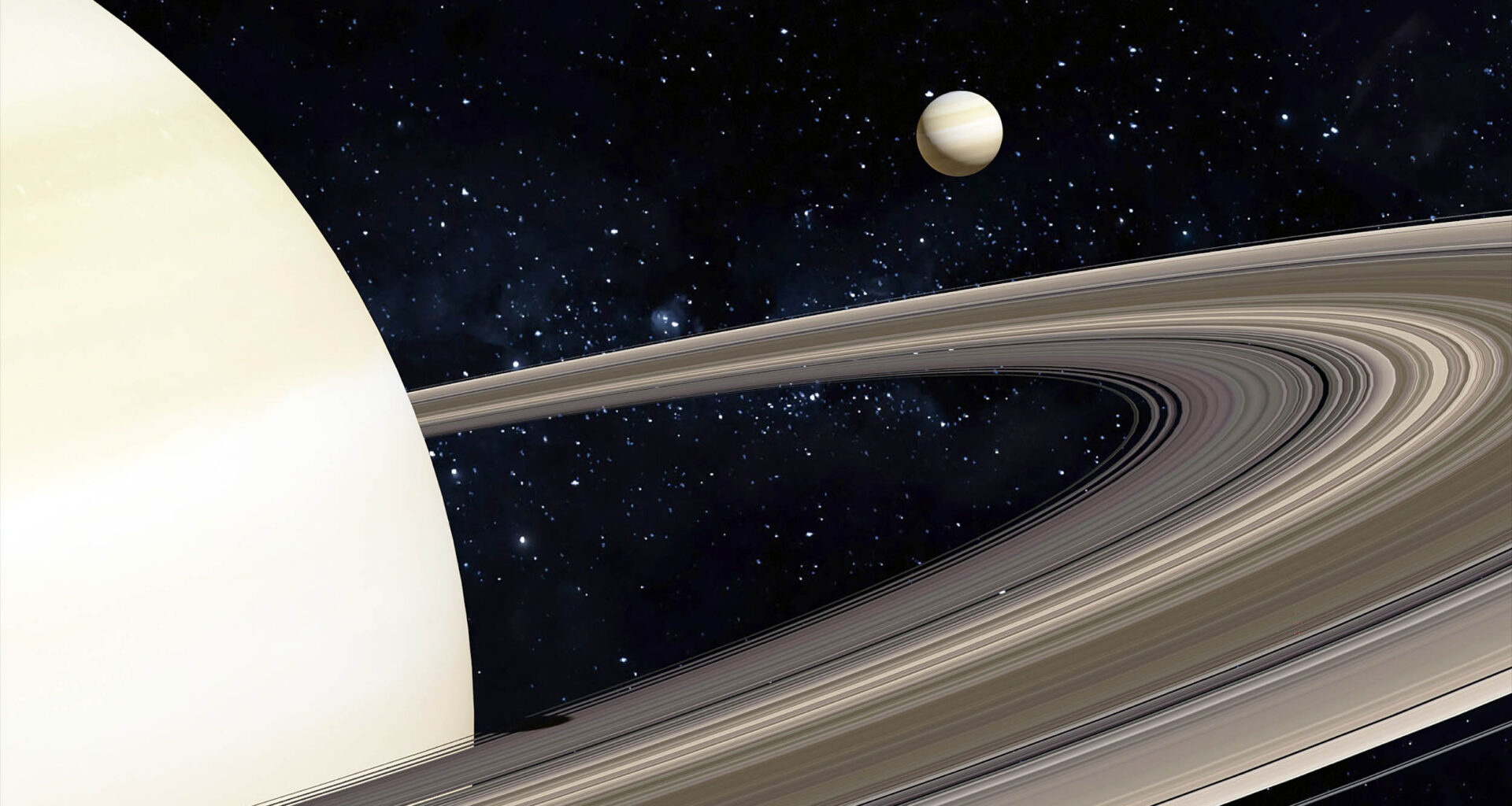 Tiny moon of Saturn exerts unexpected forces on the solar system