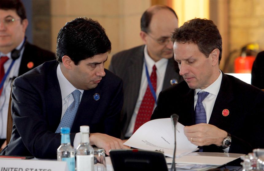 Secretary of the Treasury Timothy Geithner (R) confers with Kevin Warsh (L), member of the Board of Governors of the Federal Reserve, during the G20 meeting of finance ministers near Horsham, West Sussex, England, on March 14, 2009.