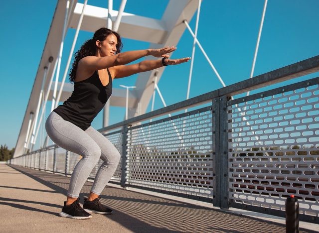 Young women in crouching position