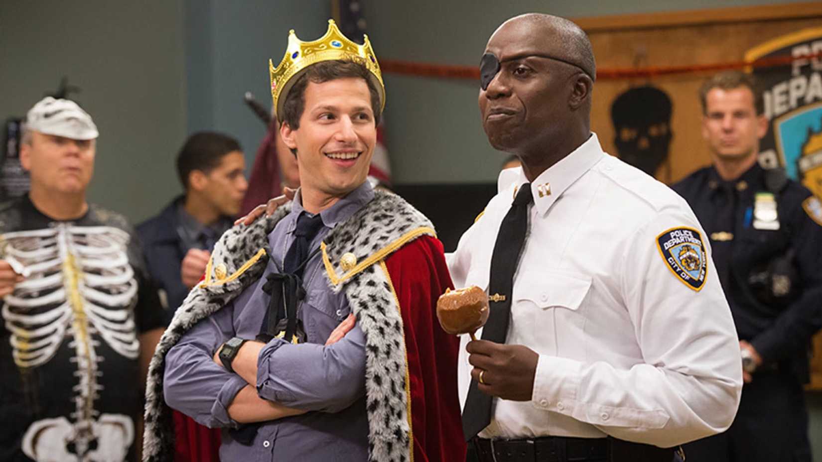 Captain Raymond Holt crowning Jake Peralta in Brooklyn Nine-Nine's Halloween Heist.